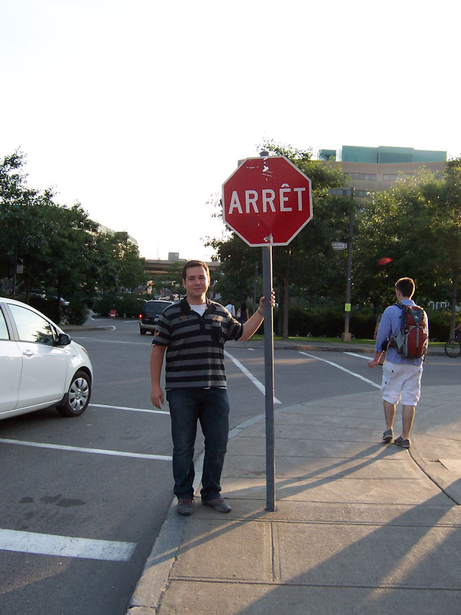 Holding a traffic signal in Québec City, QC, Canada (August 2009).